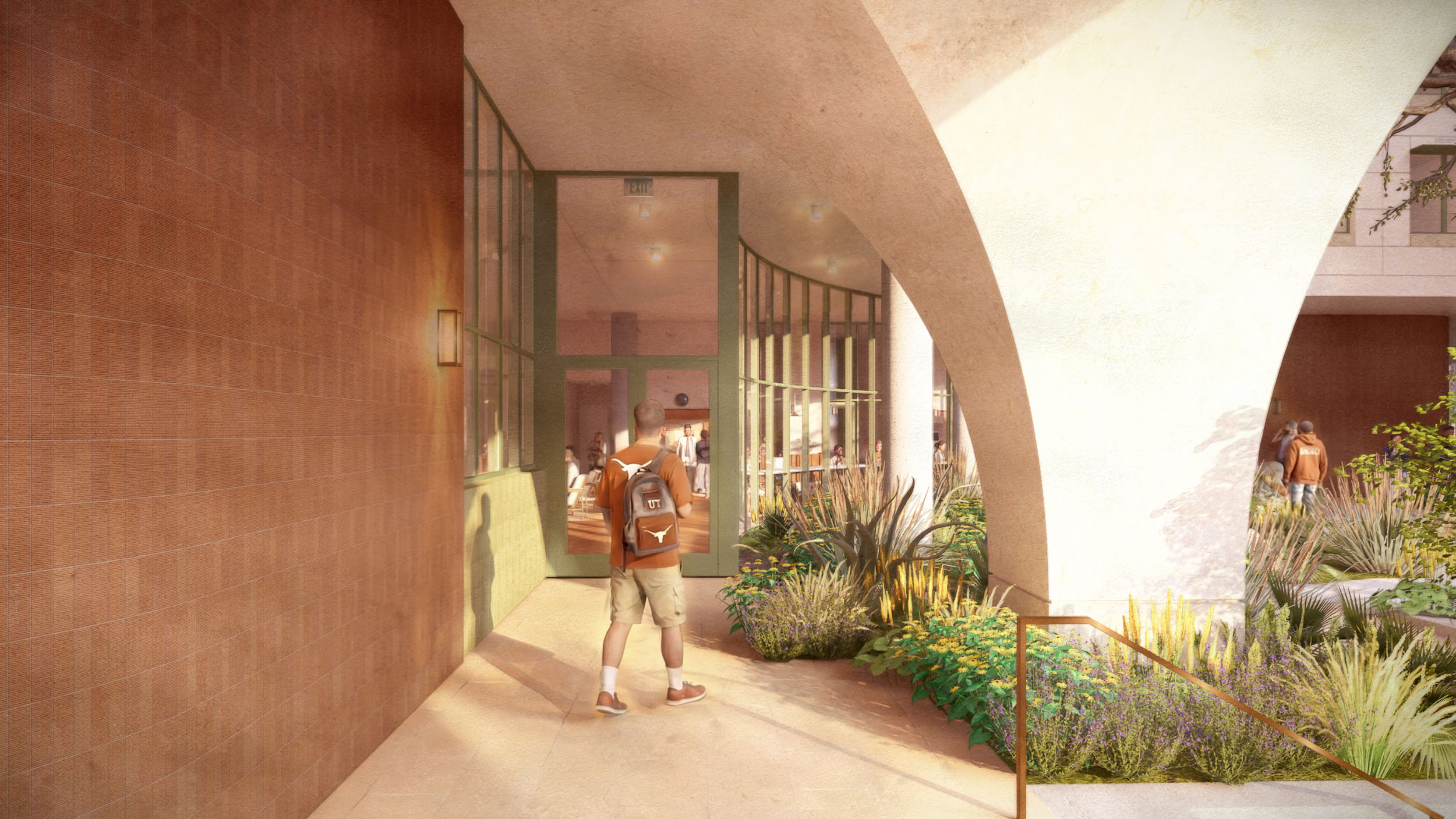 A student walks toward a glass entrance door to the lobby under a large arch. Plants fill a garden bed beside the walkway, with more students visible in a courtyard beyond the arch.