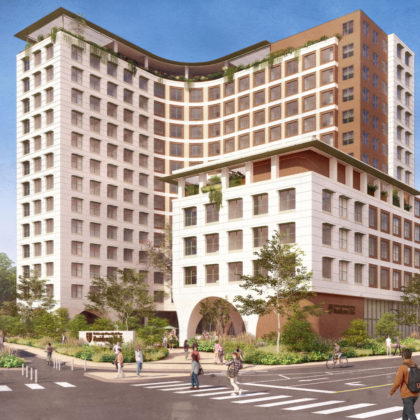 Corner exterior view of the residence hall from the Dean Keaton and Medical Arts intersection. Students walk through a crosswalk in the foreground. The building features a curved facade, arched entrance, and rooftop greenery.